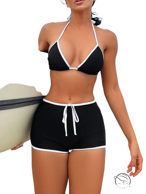 Black and white boho strap split swimsuit with halter top and high-waisted shorts