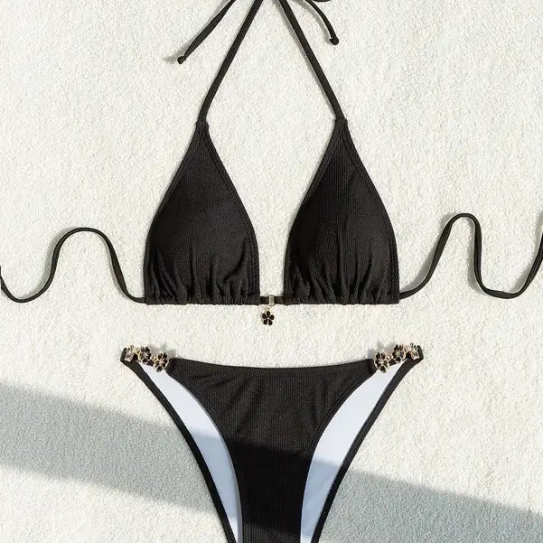 Black halter strap adjustable swimsuit with metal accents