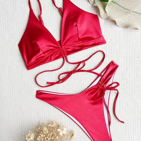Sexy backless swimsuit in red satin with lace-up sides and tie straps
