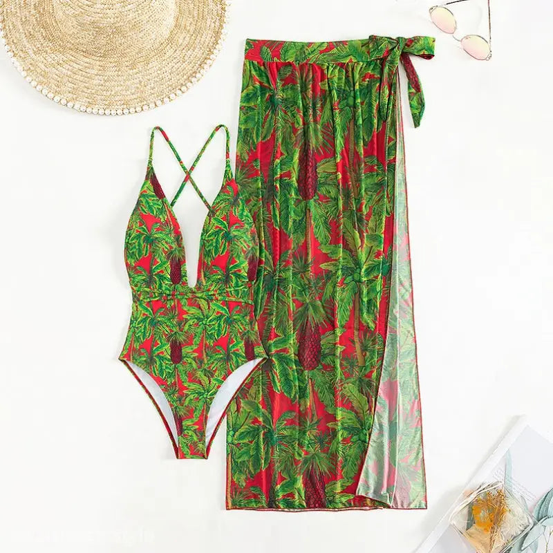 Red and green palm print two piece set with deep V-neck one-piece and sheer sarong for beach outerwear