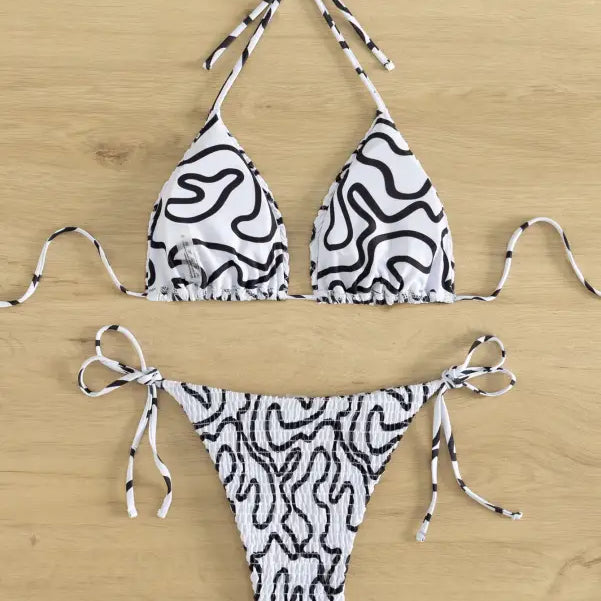Seedy bikini set featuring black and white abstract swirling pattern for summer vacations