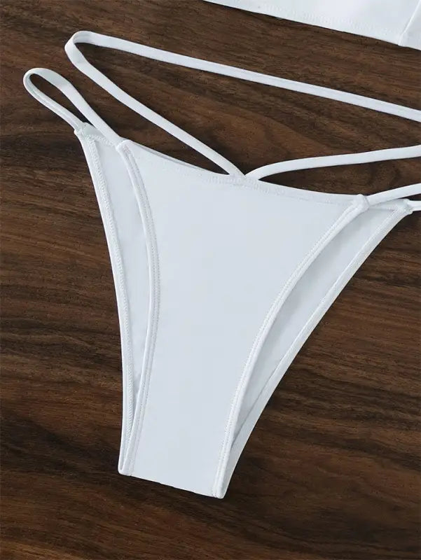 White bikini bottom with string ties from Boho Small Circle Swimsuit collection