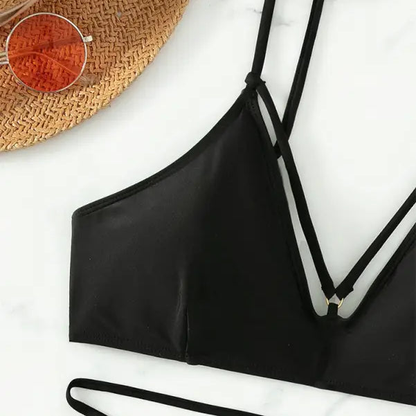 Black bikini top with spaghetti straps from the Boho Small Circle Swimsuit collection