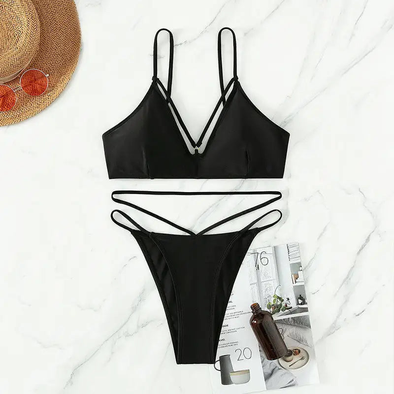 Black two-piece swimsuit from Boho Small Circle Swimsuit collection, stylish summer vacation wear
