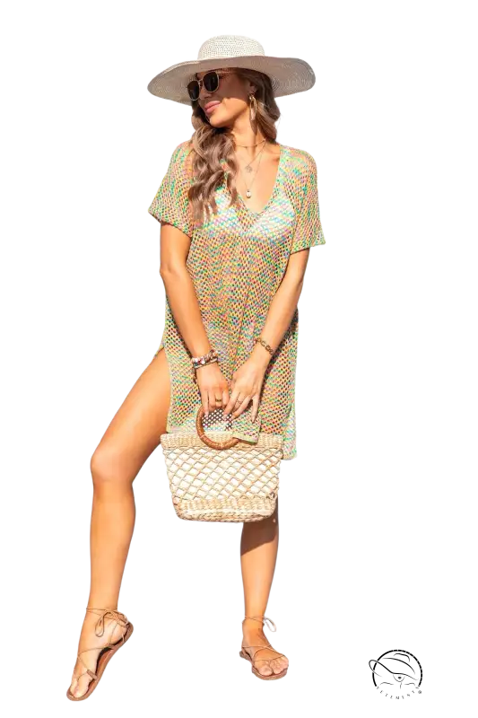 Woman in boho summer beach cover dress, hat, sunglasses, holding bag