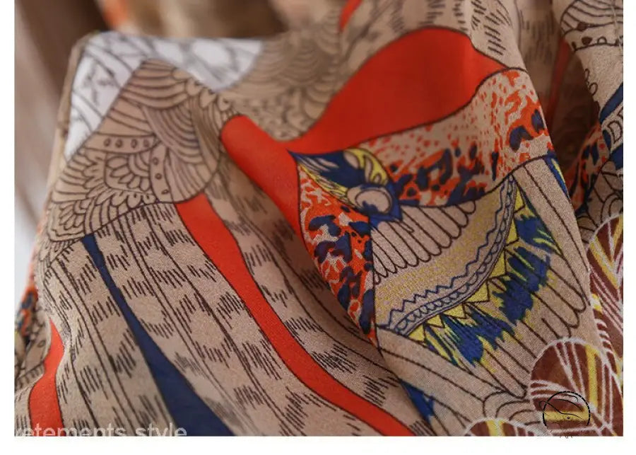 Colorful patterned silk scarf as boho summer beach cover with fringe sleeve length