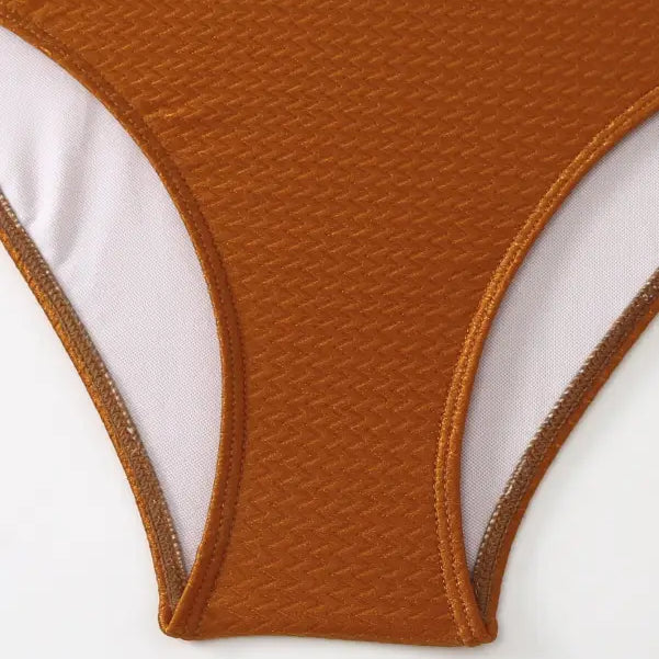 Textured brown bikini bottom paired with the Boho Summer Color Block Jumpsuit