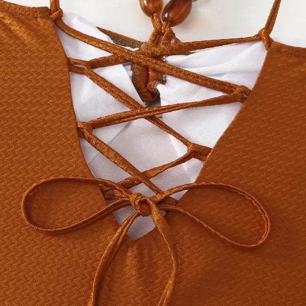 Brown criss-cross swimsuit paired with Boho summer color block jumpsuit in Wine Red