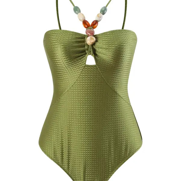 Olive green one-piece swimsuit with beaded straps, complementing the Green Jumpsuit