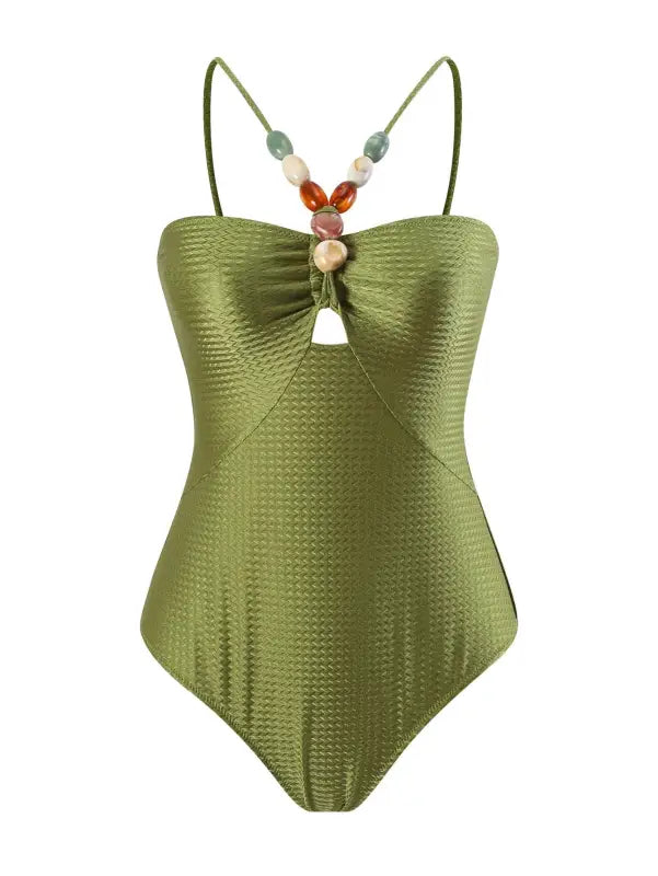 Olive green one-piece swimsuit with beaded straps, complementing the Green Jumpsuit