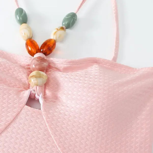 Pink textured top with beaded straps on Boho Summer Color Block Jumpsuit in Pink