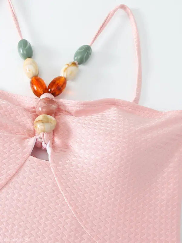 Pink textured top with beaded straps on Boho Summer Color Block Jumpsuit in Pink