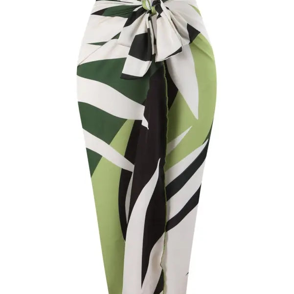 Green and white patterned sarong paired with Boho Summer Color Block Jumpsuit options