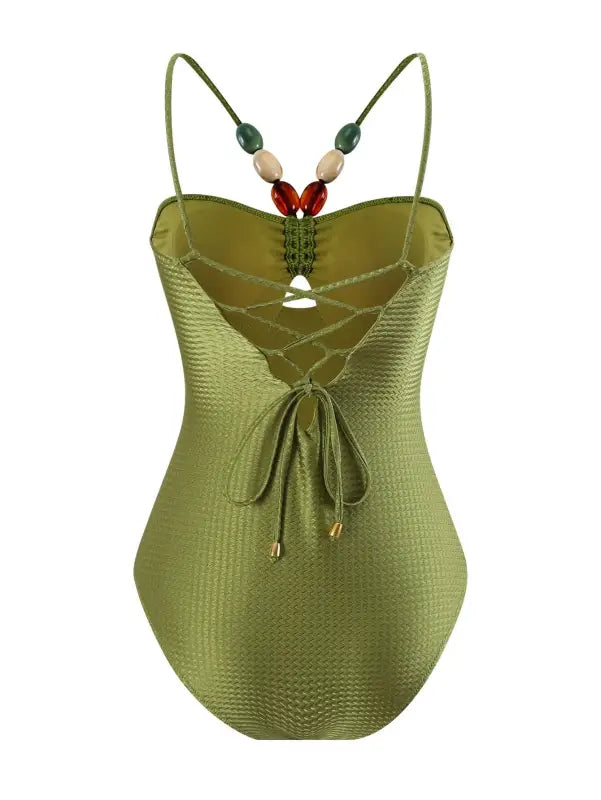 Olive green swimsuit with beaded straps, complements the Boho Summer Color Block Jumpsuit