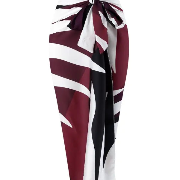 Maroon, white, and black patterned sarong paired with a Boho summer wine red jumpsuit