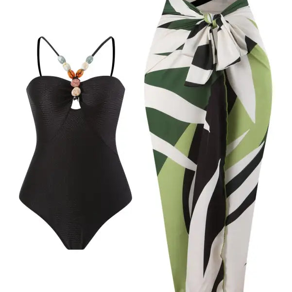 Black swimsuit with beaded straps styled with Boho Summer Color Block Jumpsuit in Green