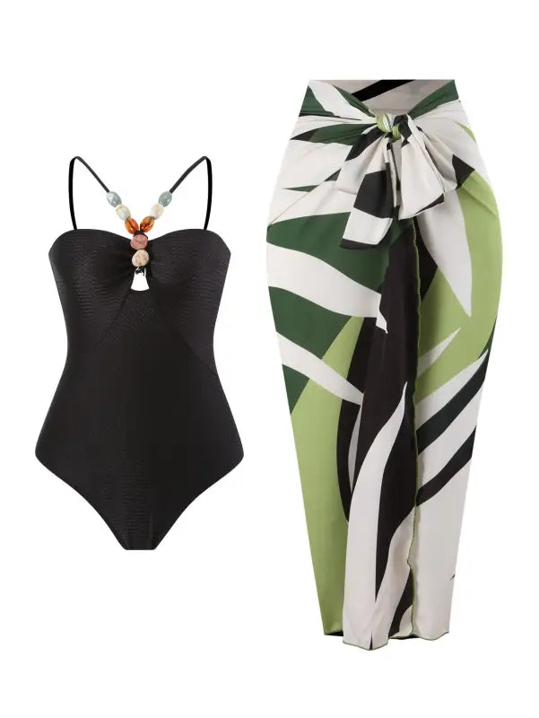 Black swimsuit with beaded straps styled with Boho Summer Color Block Jumpsuit in Green