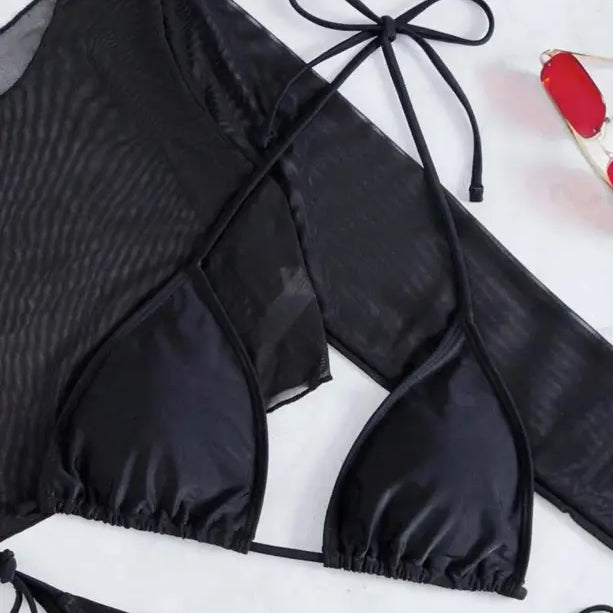 Black long-sleeved bikini top with tie closures.