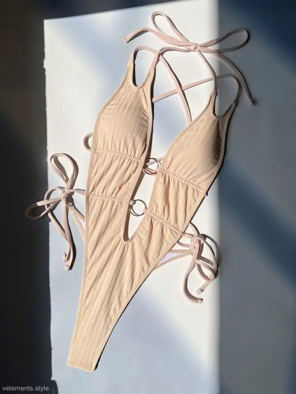 Beige ribbed one-piece swimsuit with tie straps from Boho Summers, offering free shipping