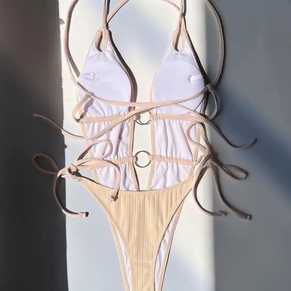 Beige one-piece swimsuit with ring details from Boho Summers, featuring free shipping