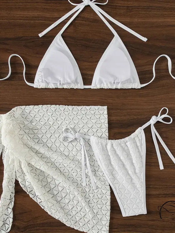 White three piece bikini set with lace cover-up skirt for summer