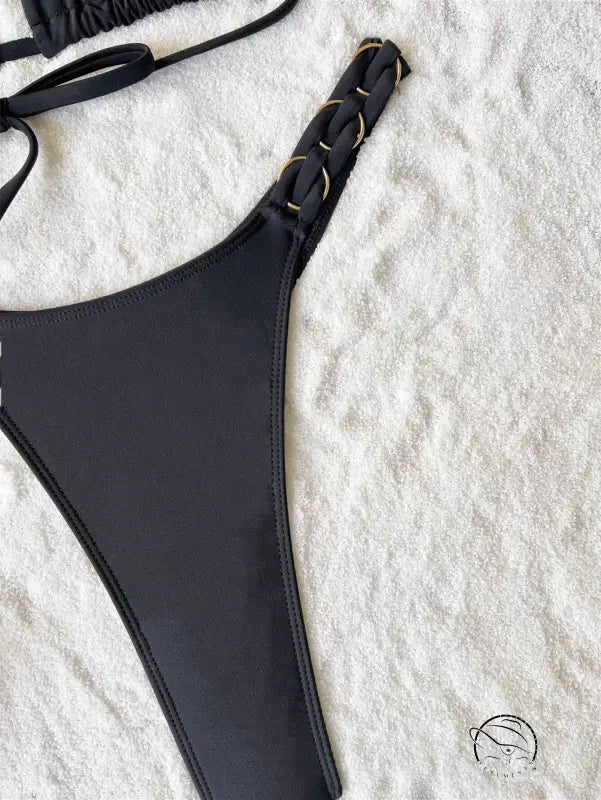 Sexy vacation swimsuit bottom in black with gold chain detail