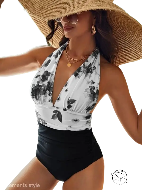 Stylish white tie-dye printing bikini with floral halter top and black ruched bottoms