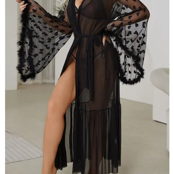 Sheer black robe with wide bell sleeves, heart patterns, and fur trim.