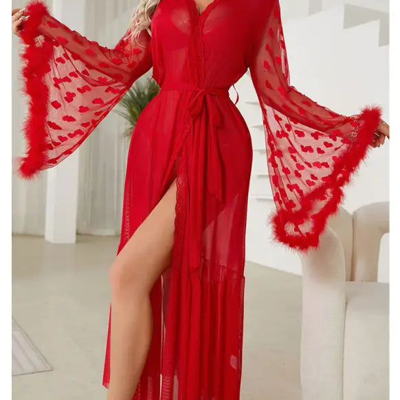 Vibrant red sheer robe with wide bell sleeves and feather trim.