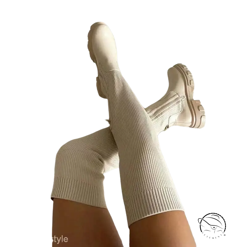 British style knee high boots in cream ribbed knit with fur lining