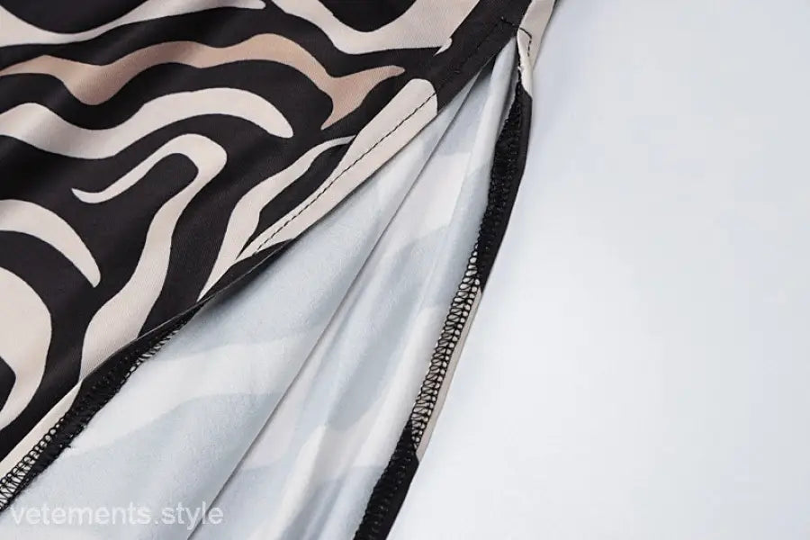 BROWN ZEBRA PRINT DRESS-VETEMENTS