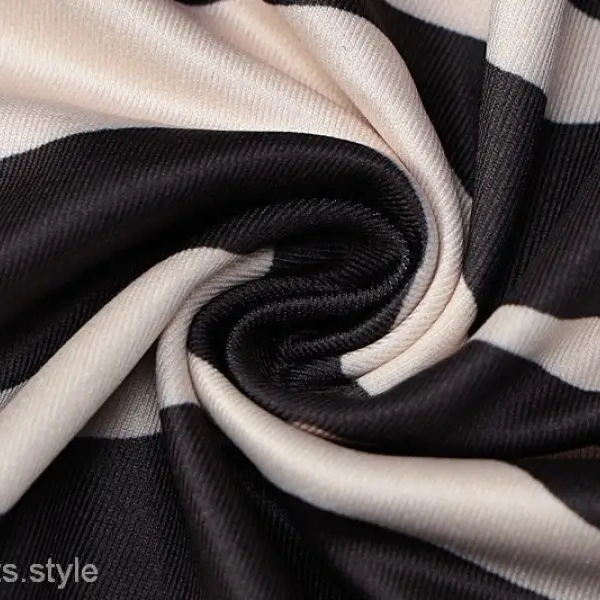 Brown zebra print backless sleeveless dress with twisted black and white striped fabric