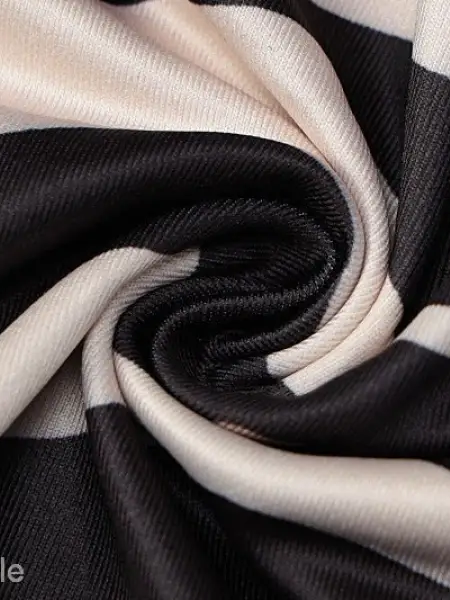 Brown zebra print backless sleeveless dress with twisted black and white striped fabric