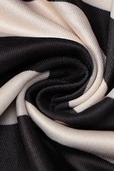 Brown zebra print backless sleeveless dress with twisted black and white striped fabric