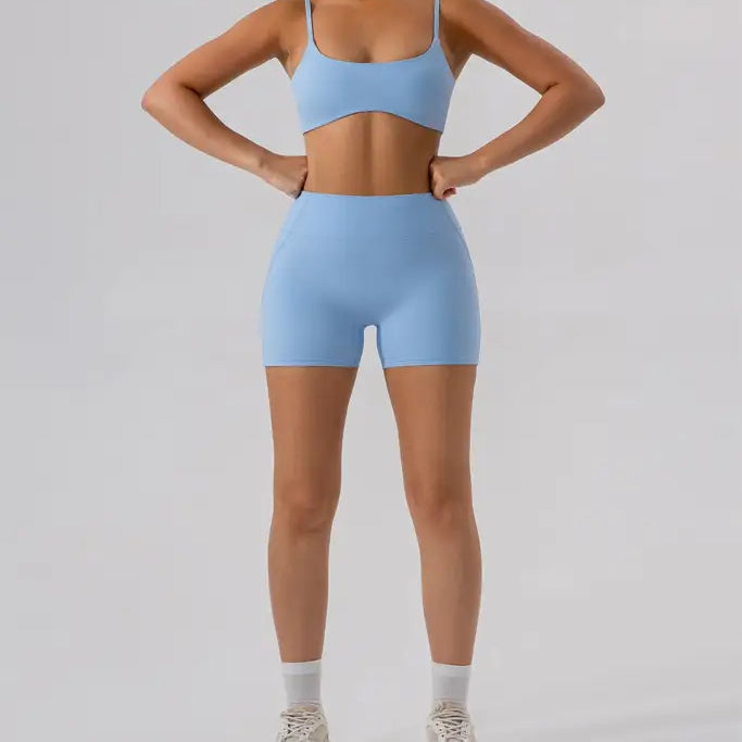 Light blue athletic set featuring Burnt Tea Brown Close Fitting Yoga Shorts in Sporty Slim Nylon