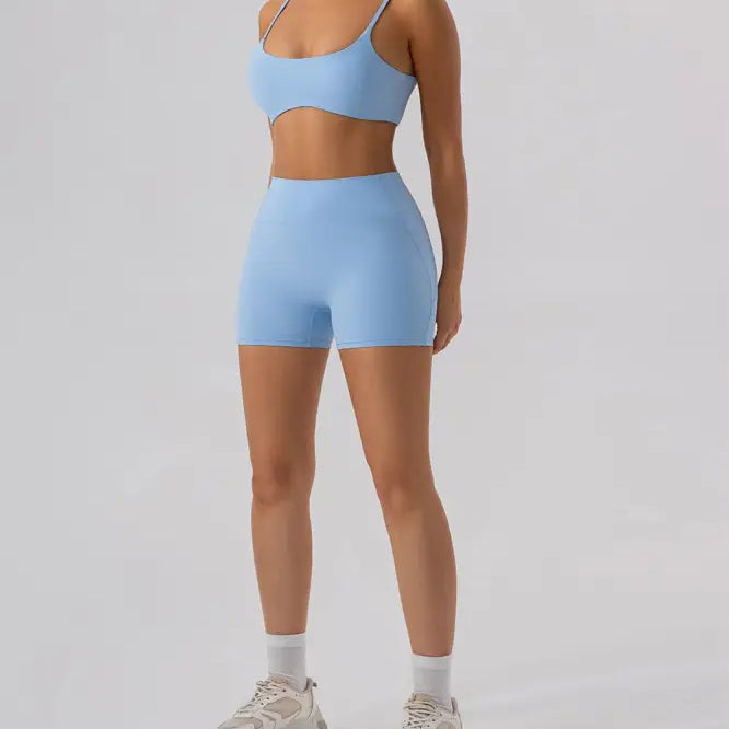 Light blue athletic set featuring Burnt Tea Brown Close Fitting Yoga Shorts in Sporty Slim Nylon