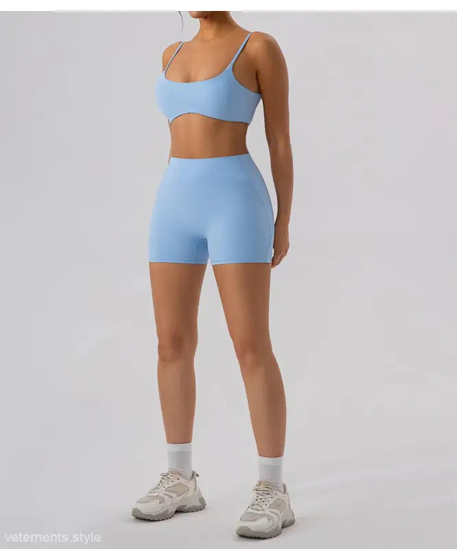Light blue athletic set featuring Burnt Tea Brown Close Fitting Yoga Shorts in Sporty Slim Nylon