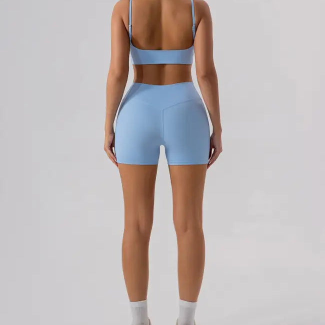 Light blue athletic set featuring Burnt Tea Brown Close Fitting Yoga Shorts in Sporty Slim Nylon