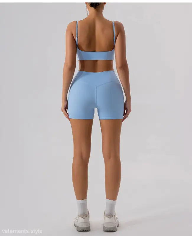 Light blue athletic set featuring Burnt Tea Brown Close Fitting Yoga Shorts in Sporty Slim Nylon