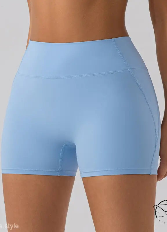 Light blue close fitting yoga shorts in comfy slim nylon