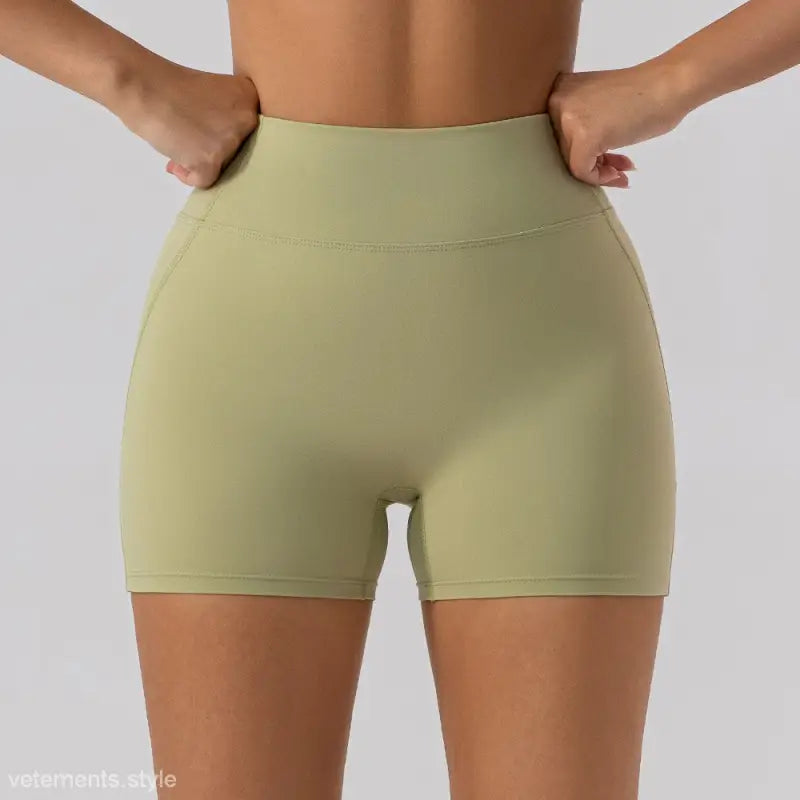 Olive green athletic shorts from Burnt Tea Brown Close Fitting Yoga Shorts collection