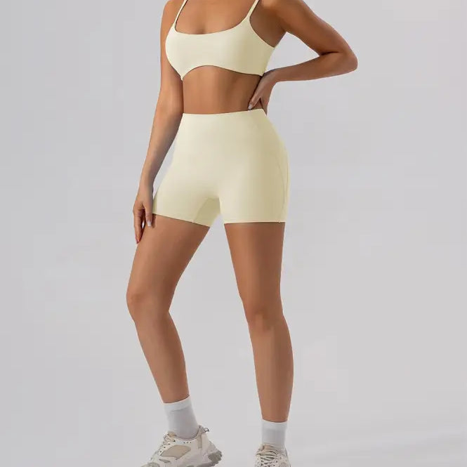 Matching burnt tea brown athletic bra and shorts set for close fitting yoga outer wear