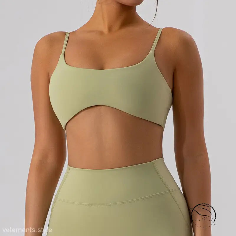 Burnt tea brown close fitting yoga outer wear sports bra with light green cutout