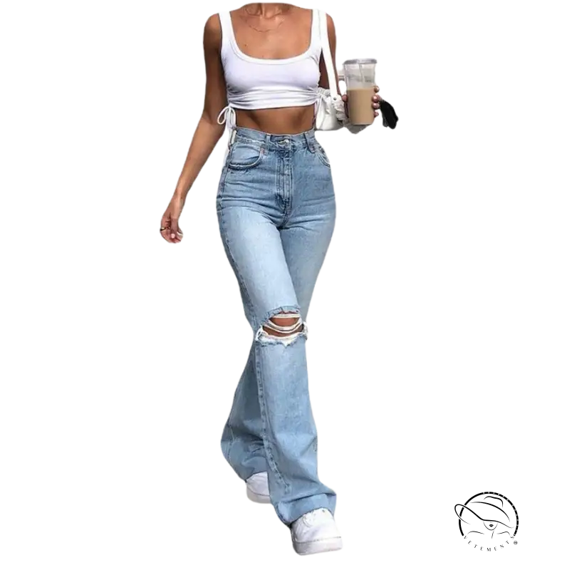 Woman in high waist retro stretch slim ripped jeans and crop top