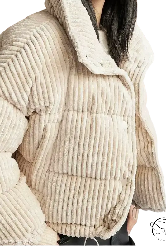 Cream-colored corduroy cotton coat with plush ribbed puffer texture