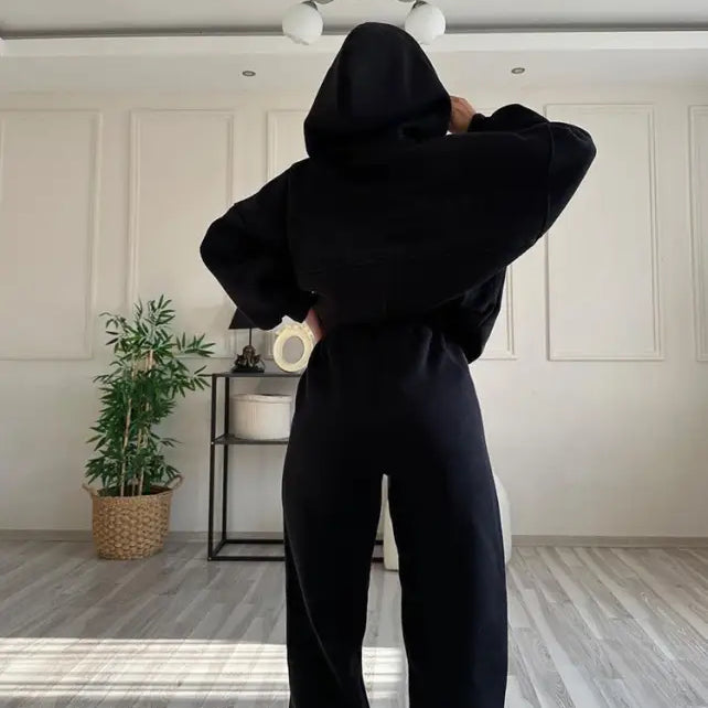 Person wearing all black casual comfy sweaters two piece winter solid color set from Casual Comfy Sweaters