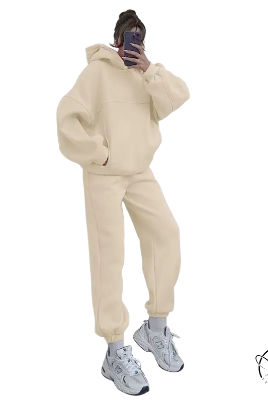 Person in casual comfy sweaters two piece winter solid color set taking mirror selfie