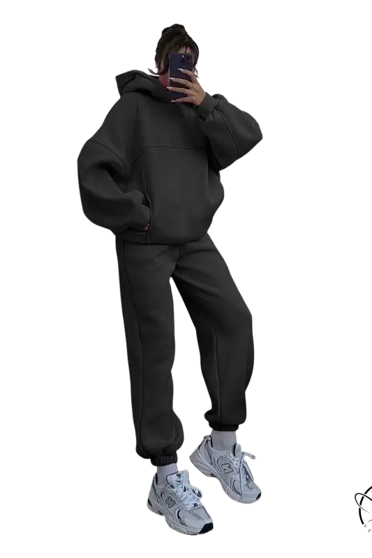 Person in casual comfy sweaters two piece winter solid color set taking mirror selfie