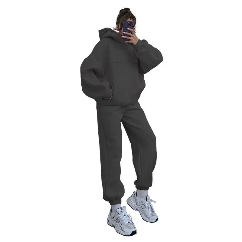 Person taking mirror selfie in casual comfy sweaters two piece winter solid color sweatsuit