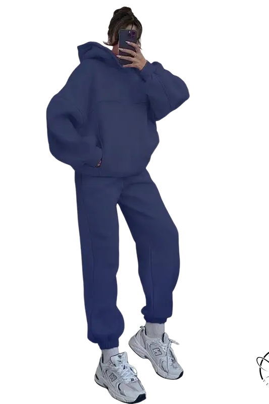 Person in navy blue casual comfy sweaters two piece taking mirror selfie